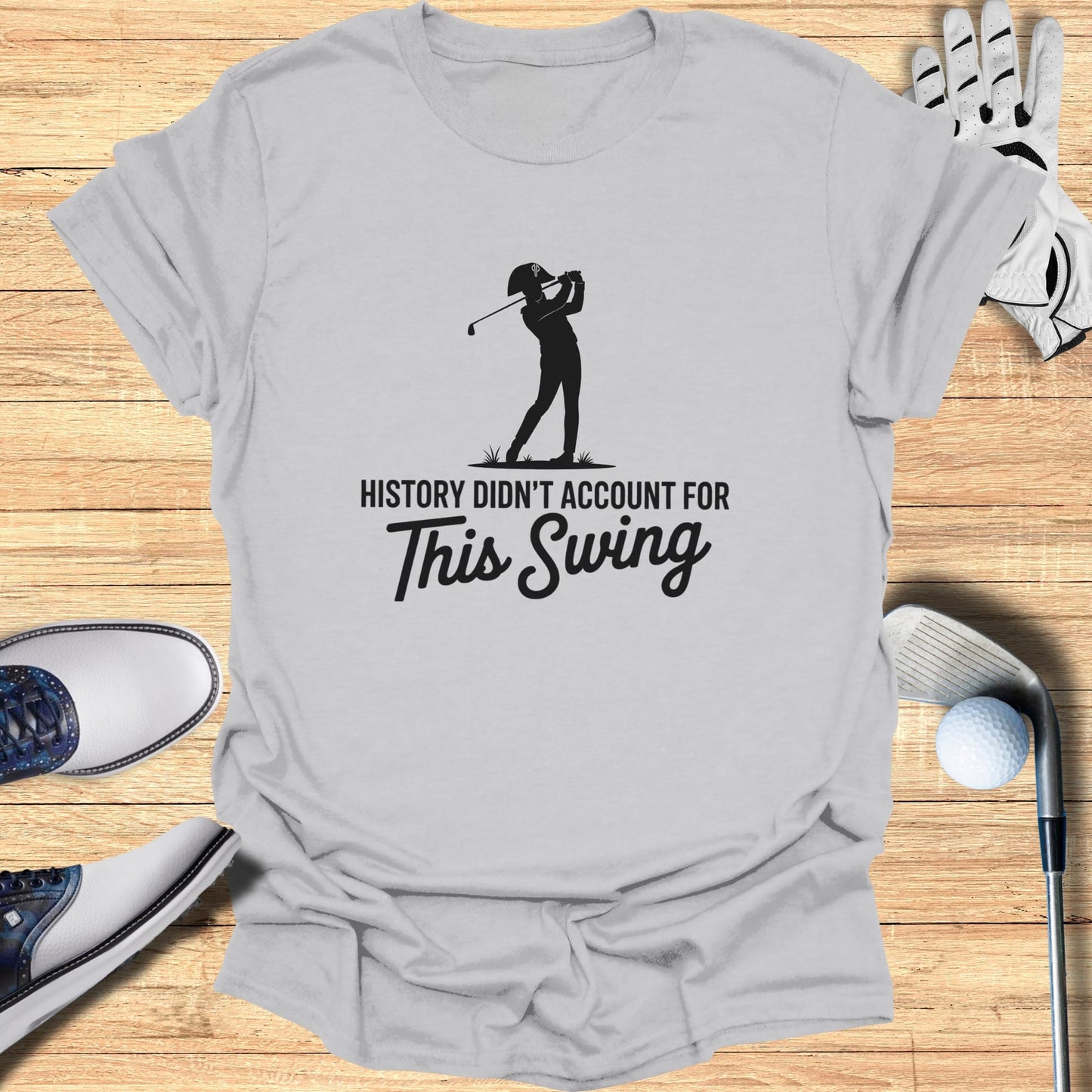 T-shirt with golfer silhouette and text "History didn't account for This Swing."