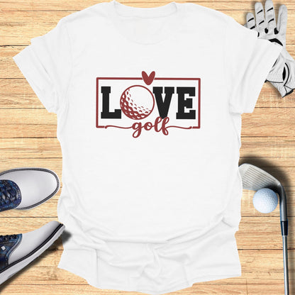 White t-shirt with "Love Golf" and a heart-shaped golf ball design.