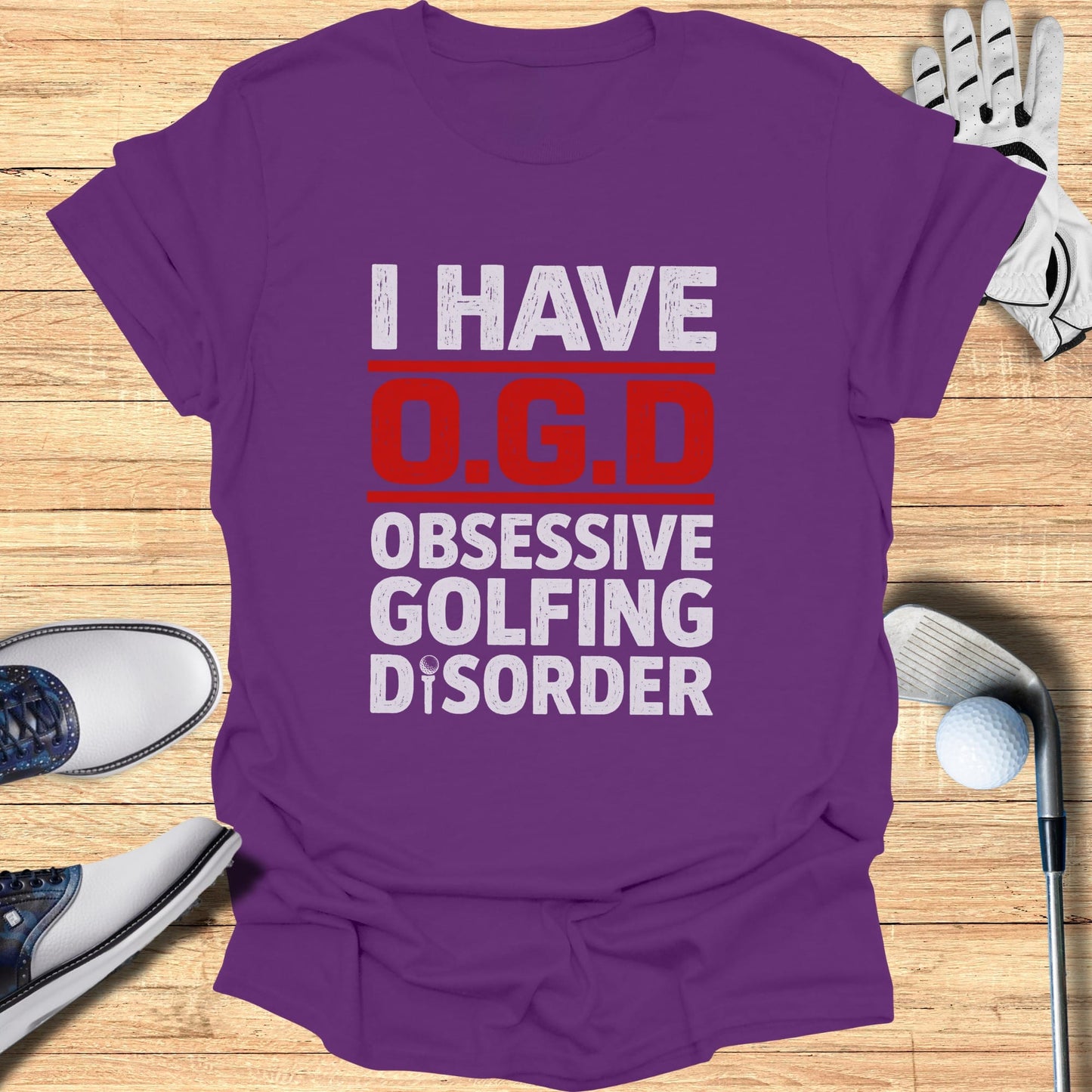 Purple t-shirt with "I Have O.G.D. Obsessive Golfing Disorder" text.