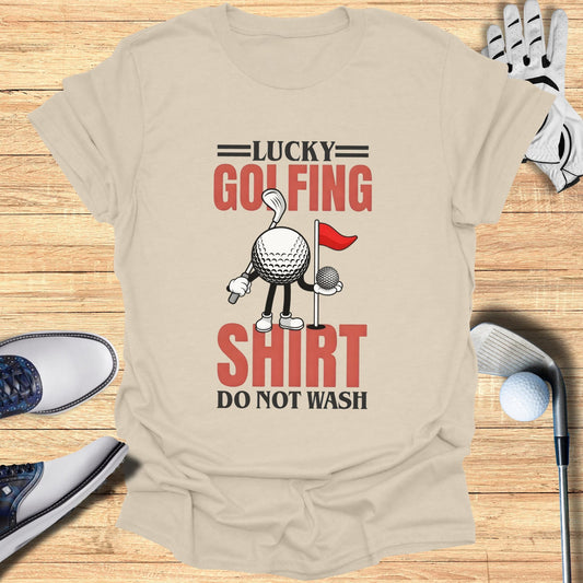 Lucky Golfing Shirt: Do Not Wash, graphic on a tan t-shirt.
