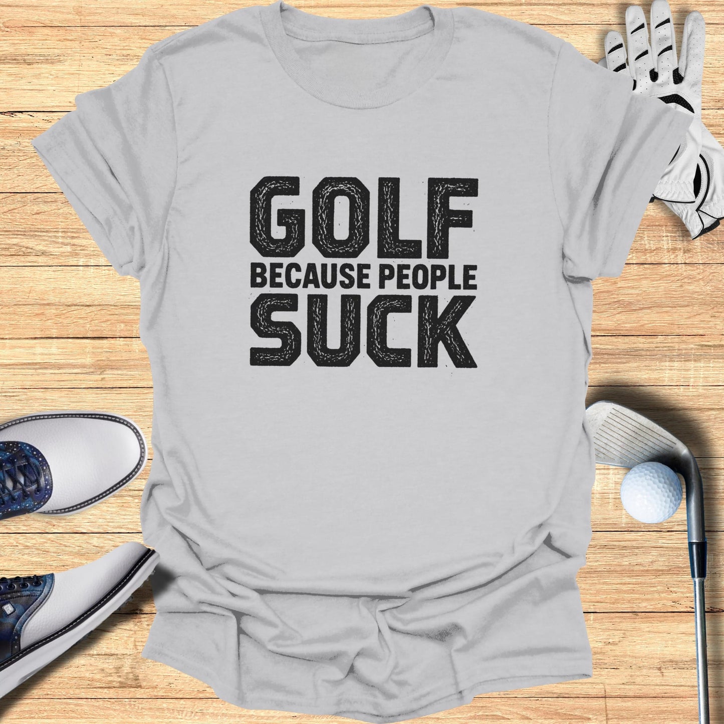 Grey t-shirt with "GOLF BECAUSE PEOPLE SUCK" text.