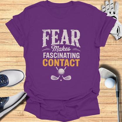 Purple t-shirt with "FEAR MAKES FASCINATING CONTACT" and golf club graphic.