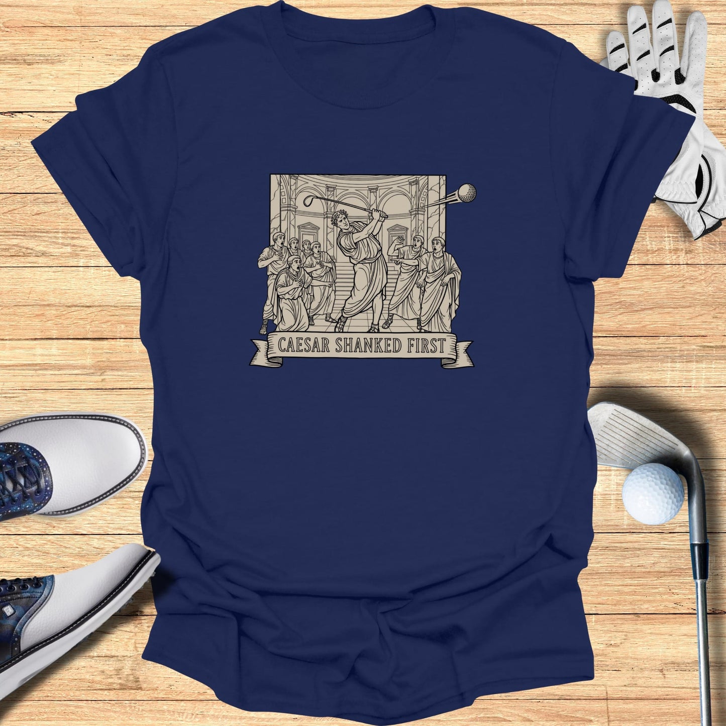 Navy t-shirt featuring a Roman-themed graphic with text "CAESAR SHANKED FIRST".