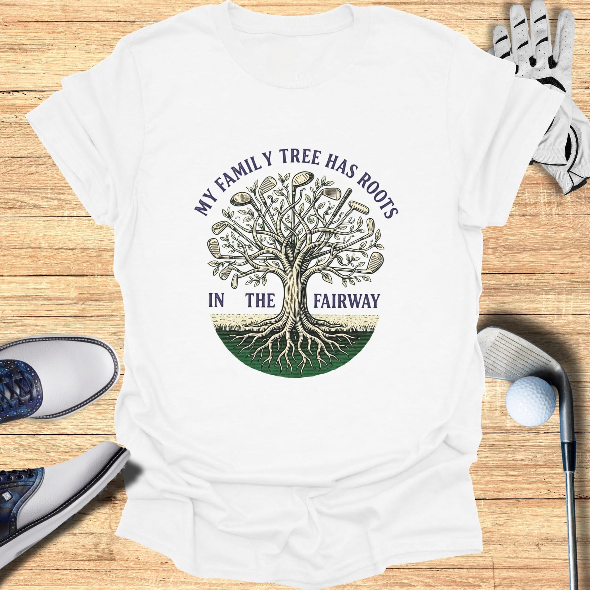 White t-shirt with "My family tree has roots in the fairway" graphic.