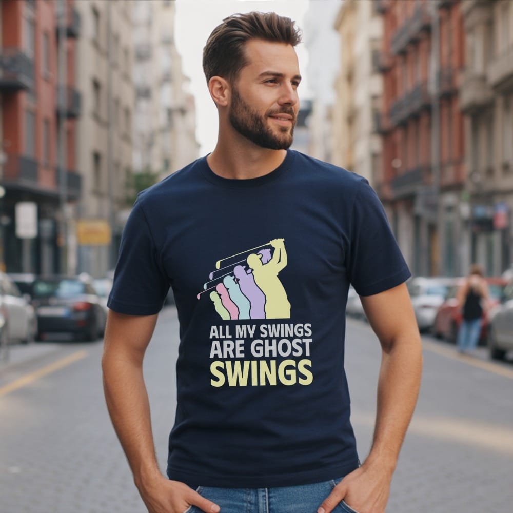 Man wearing navy t-shirt with graphic and text "All my swings are ghost swings".