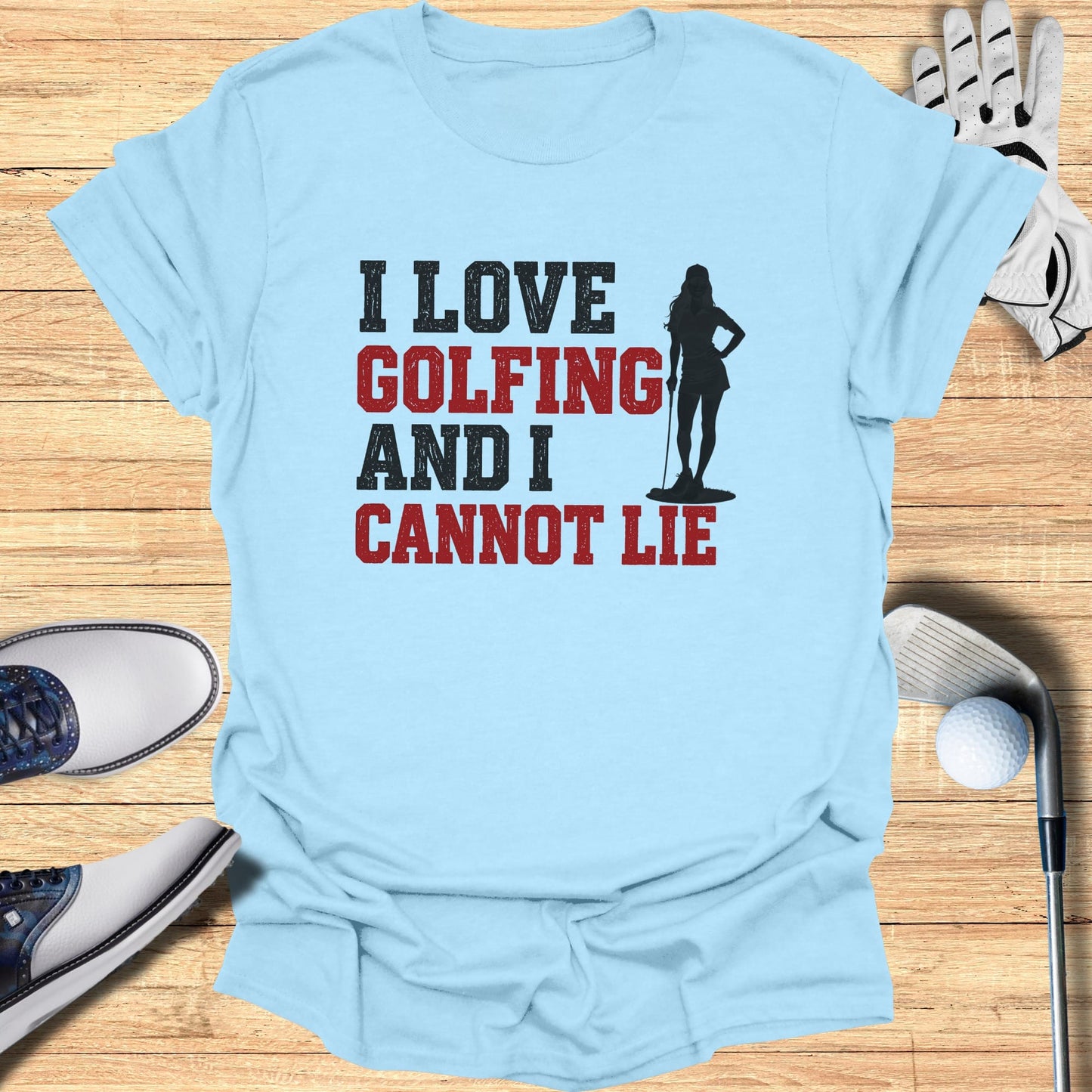 Light blue t-shirt with "I LOVE GOLFING AND I CANNOT LIE" and silhouette.