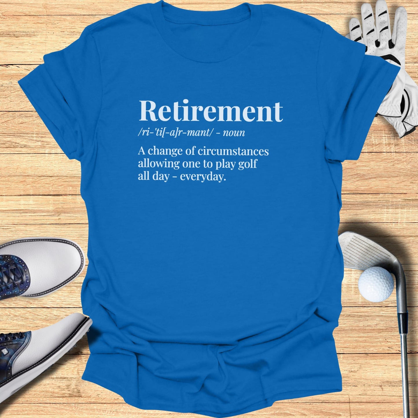 Blue t-shirt with "Retirement" definition and golf-related imagery.