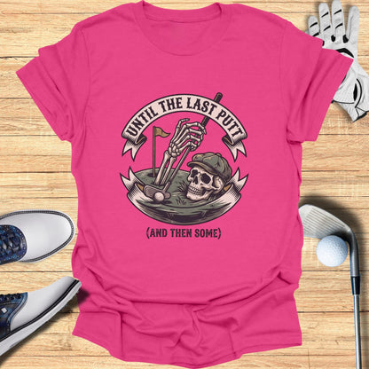 Pink t-shirt with skeleton golfer graphic and text "UNTIL THE LAST PUTT (AND THEN SOME)".