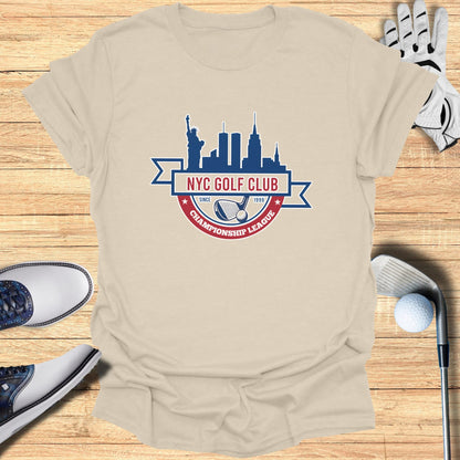 Beige t-shirt with "NYC Golf Club Championship League" logo and golf accessories.