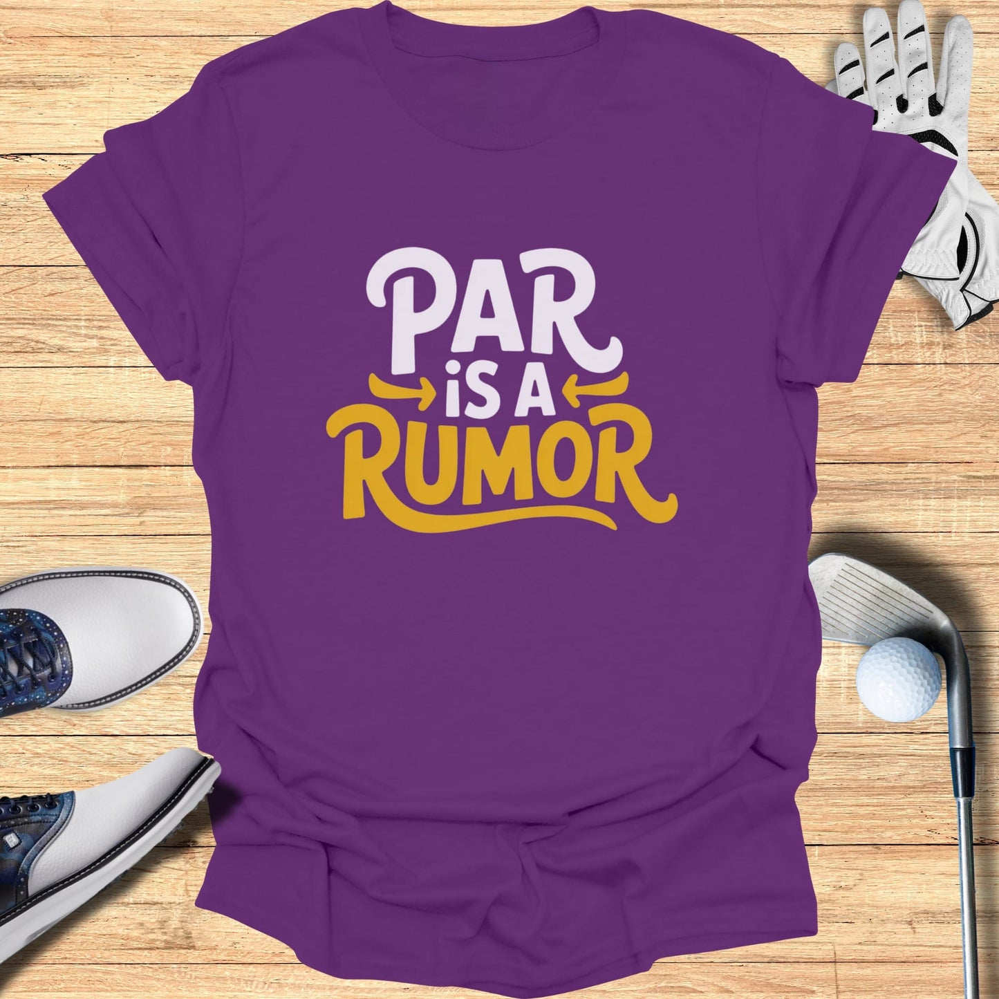 Purple t-shirt with "PAR IS A RUMOR" text, golf clubs, shoes, and ball.