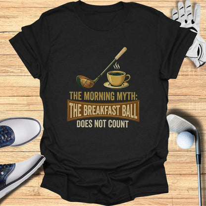 Black t-shirt with "The Morning Myth: The Breakfast Ball Does Not Count" and golf club.