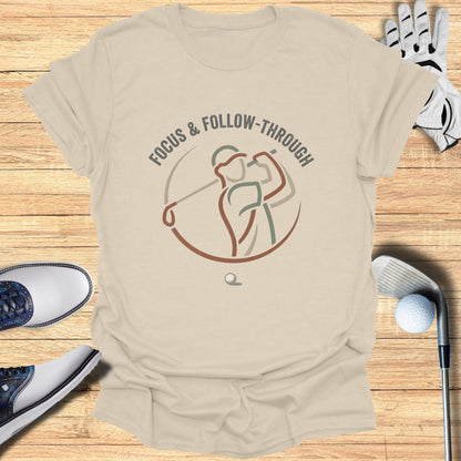 T-shirt with golfer graphic and "FOCUS & FOLLOW-THROUGH" text.