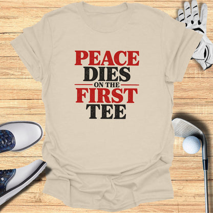 T-shirt with "Peace Dies On The First Tee" text, golf clubs, and shoes.