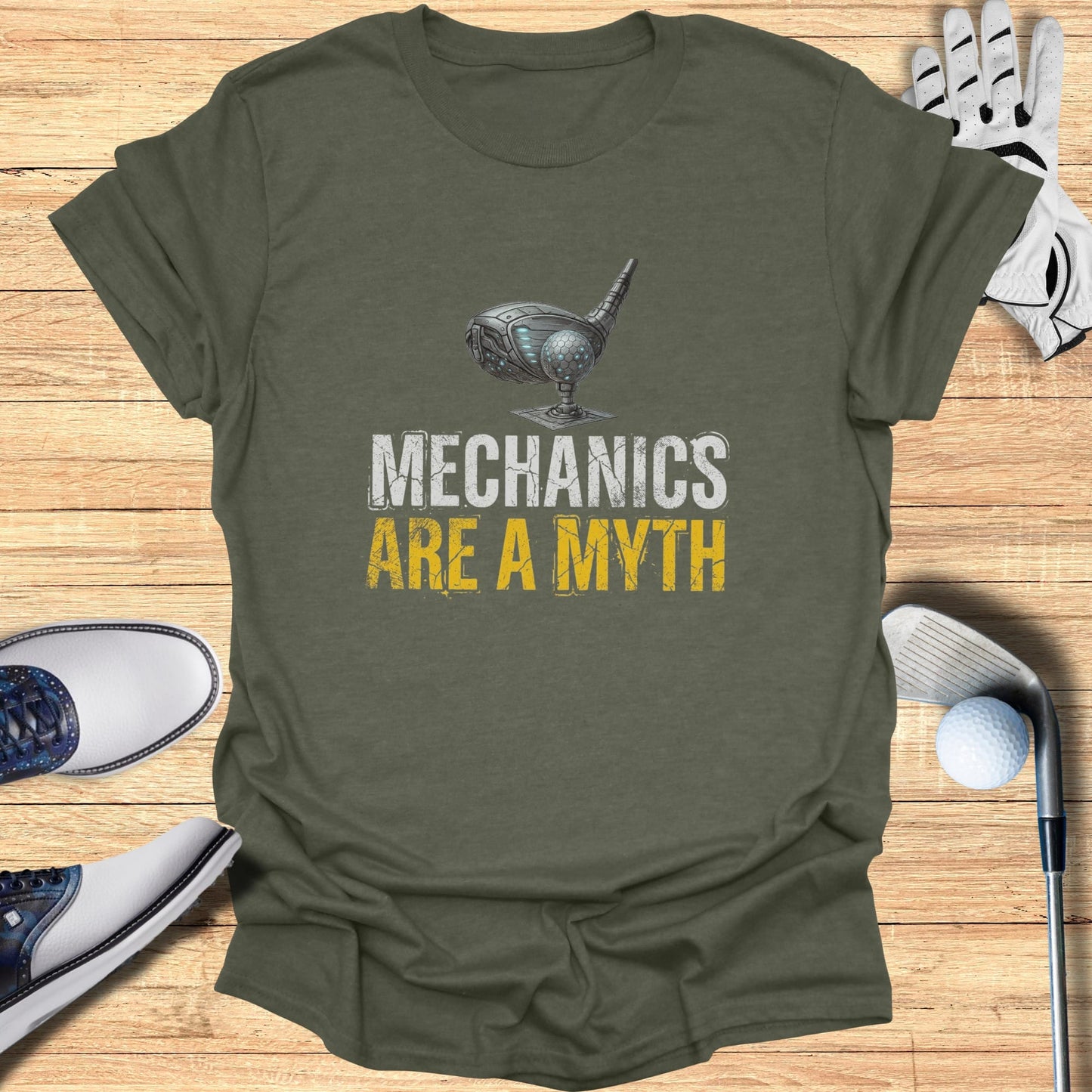 Green t-shirt with "Mechanics Are A Myth" graphic and golf accessories.