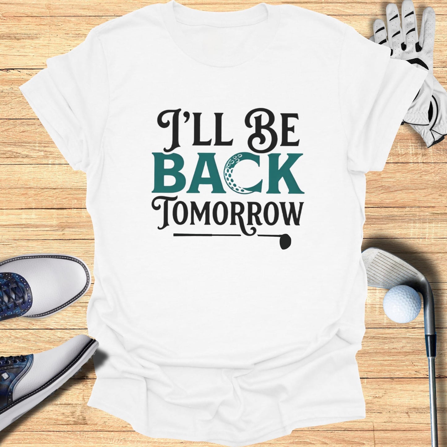 White t-shirt with "I'll be back tomorrow" text and golf imagery.