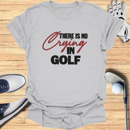 Gray t-shirt with "There is no crying in GOLF" text, golf shoes and club.
