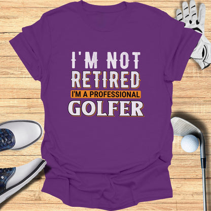Purple t-shirt with "I'm Not Retired I'm A Professional Golfer" text.