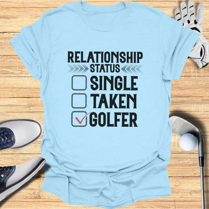 Light blue t-shirt with "RELATIONSHIP STATUS SINGLE TAKEN GOLFER" and a checked box next to Golfer.