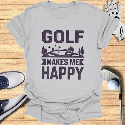 Gray t-shirt with "GOLF MAKES ME HAPPY" text and golf course illustration.