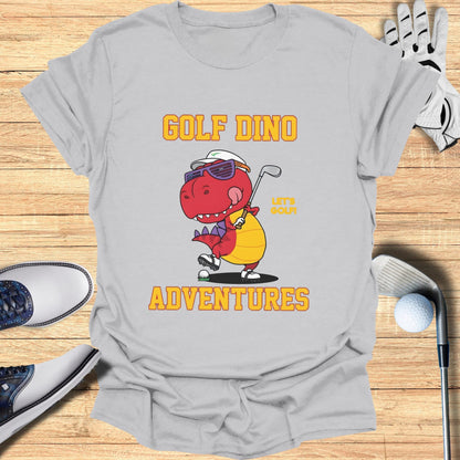Cartoon dinosaur in sunglasses playing golf, with "Golf Dino Adventures" text.