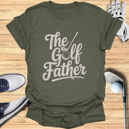 Olive green t-shirt with "The Golf Father" graphic and golf accessories.