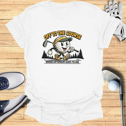 T-shirt with cartoon golfer and text "Off to the Course. Where optimism goes to die."