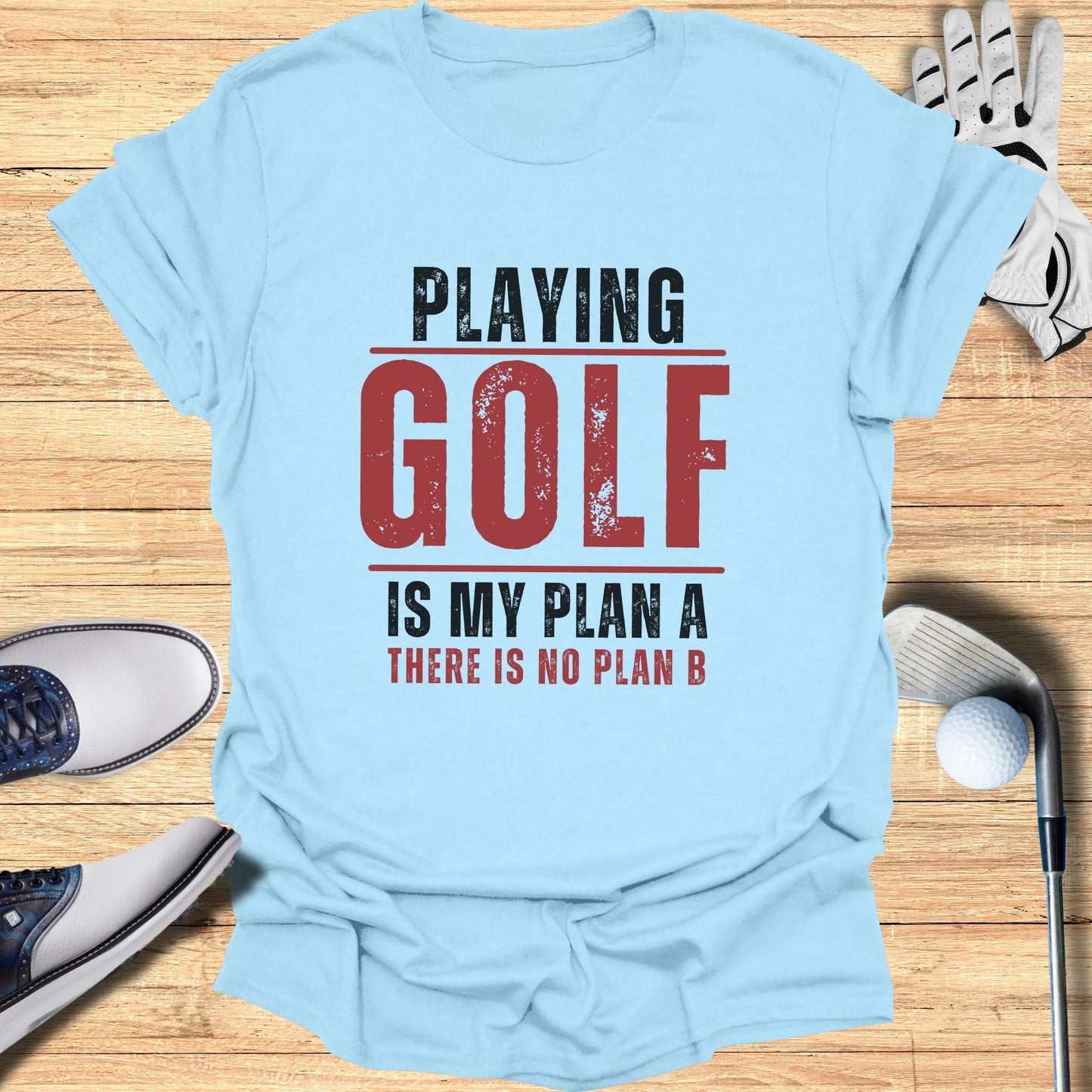 Light blue t-shirt with red and black text "PLAYING GOLF IS MY PLAN A THERE IS NO PLAN B".