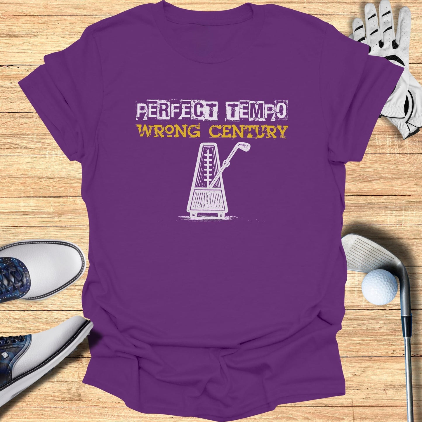 Purple t-shirt with "Perfect Tempo Wrong Century" text and metronome graphic.