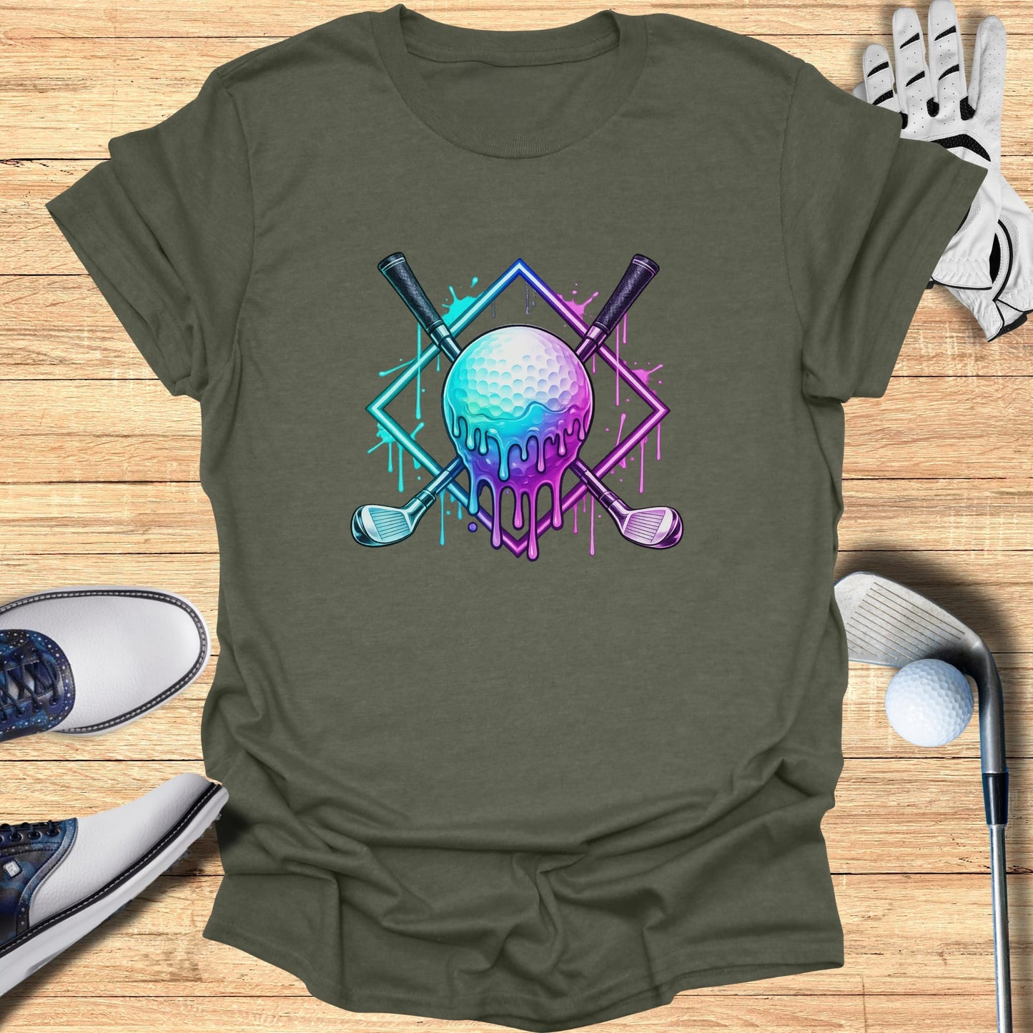 Golf clubs and ball with dripping neon paint design on t-shirt.