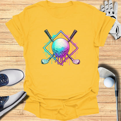 Golf club and ball graphic with dripping paint on yellow t-shirt.