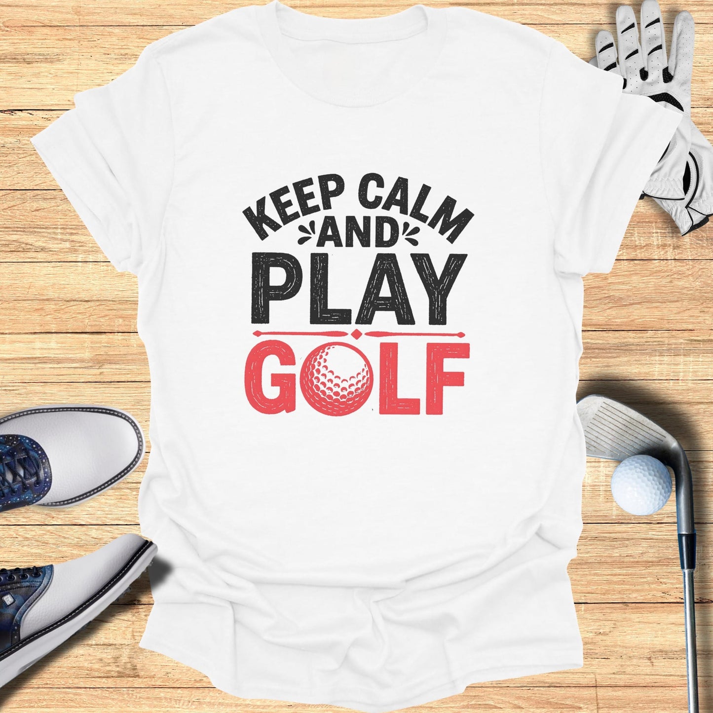 White t-shirt with "Keep Calm and Play Golf" text and a golf ball graphic.