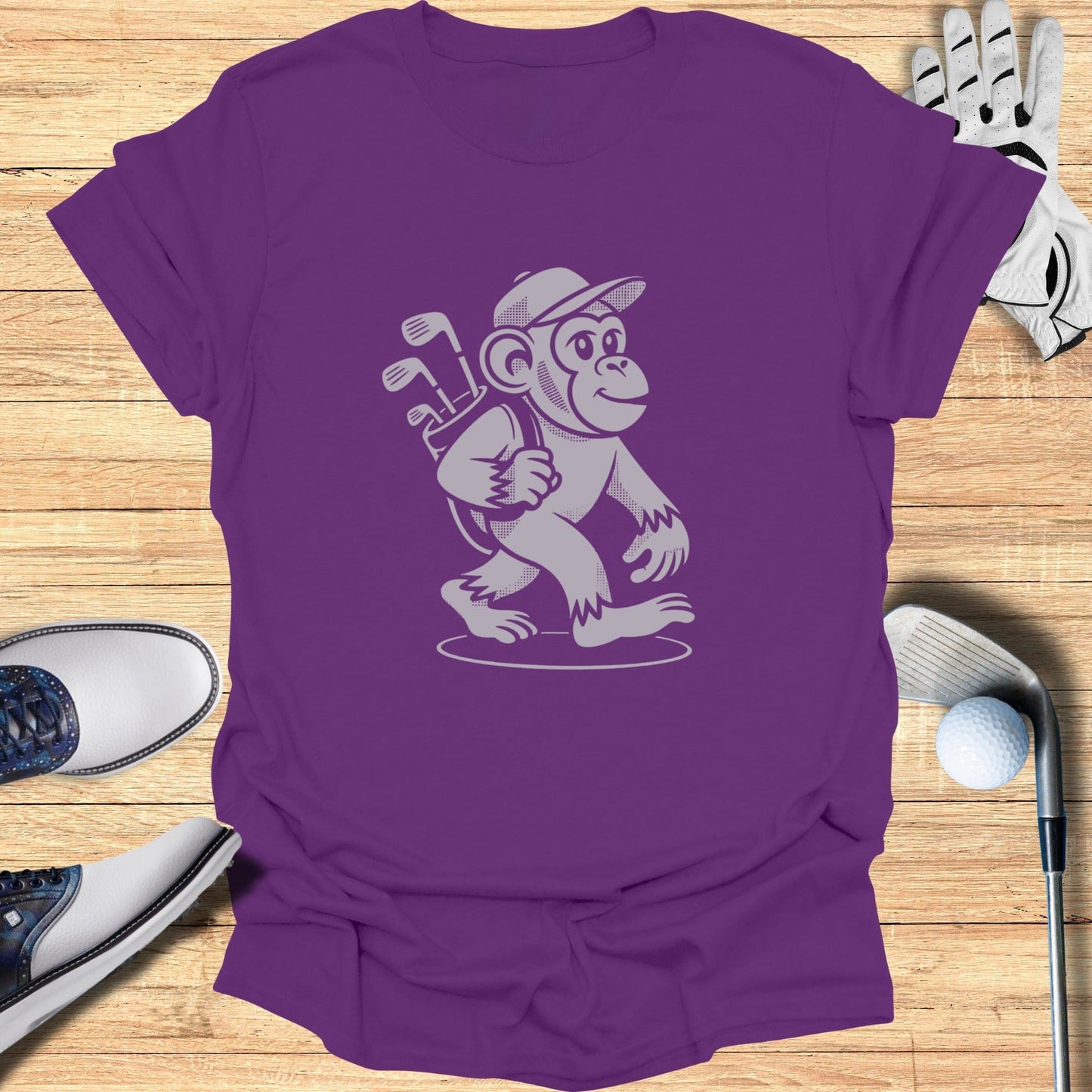 Purple T-Shirt with Graphic Monkey Playing Golf Design
