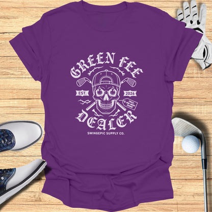Purple t-shirt with "Green Fee Dealer" text, skull, and golf clubs design.
