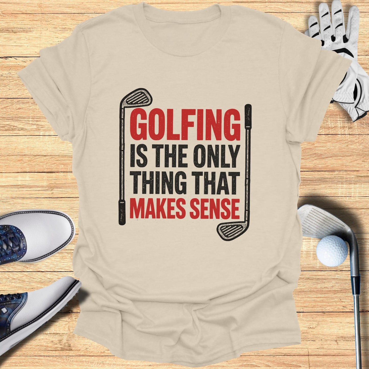 Beige t-shirt with "Golfing is the only thing that makes sense" text and golf items.