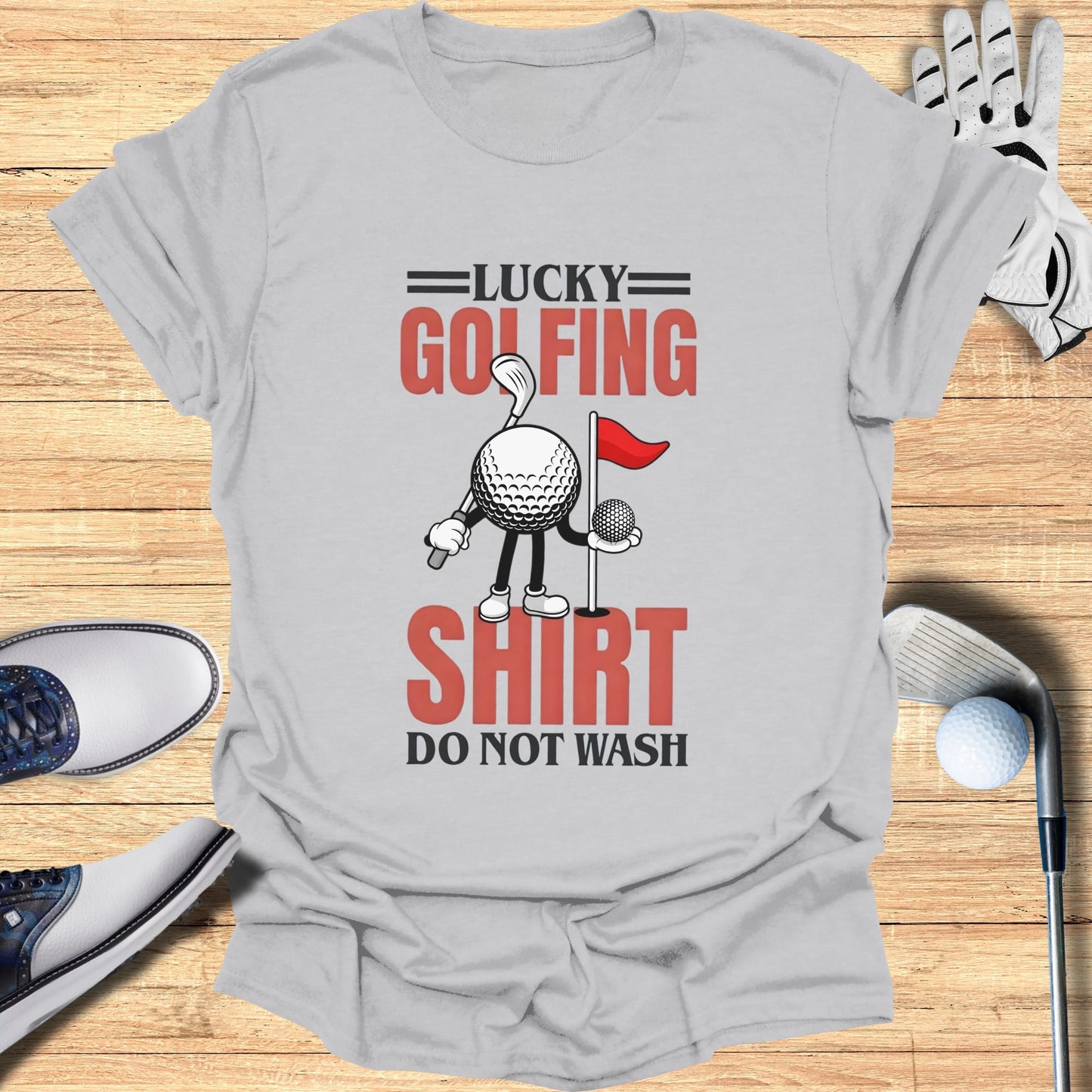 Lucky Golfing Shirt: DO NOT WASH text on a gray t-shirt with a golf ball and flag.