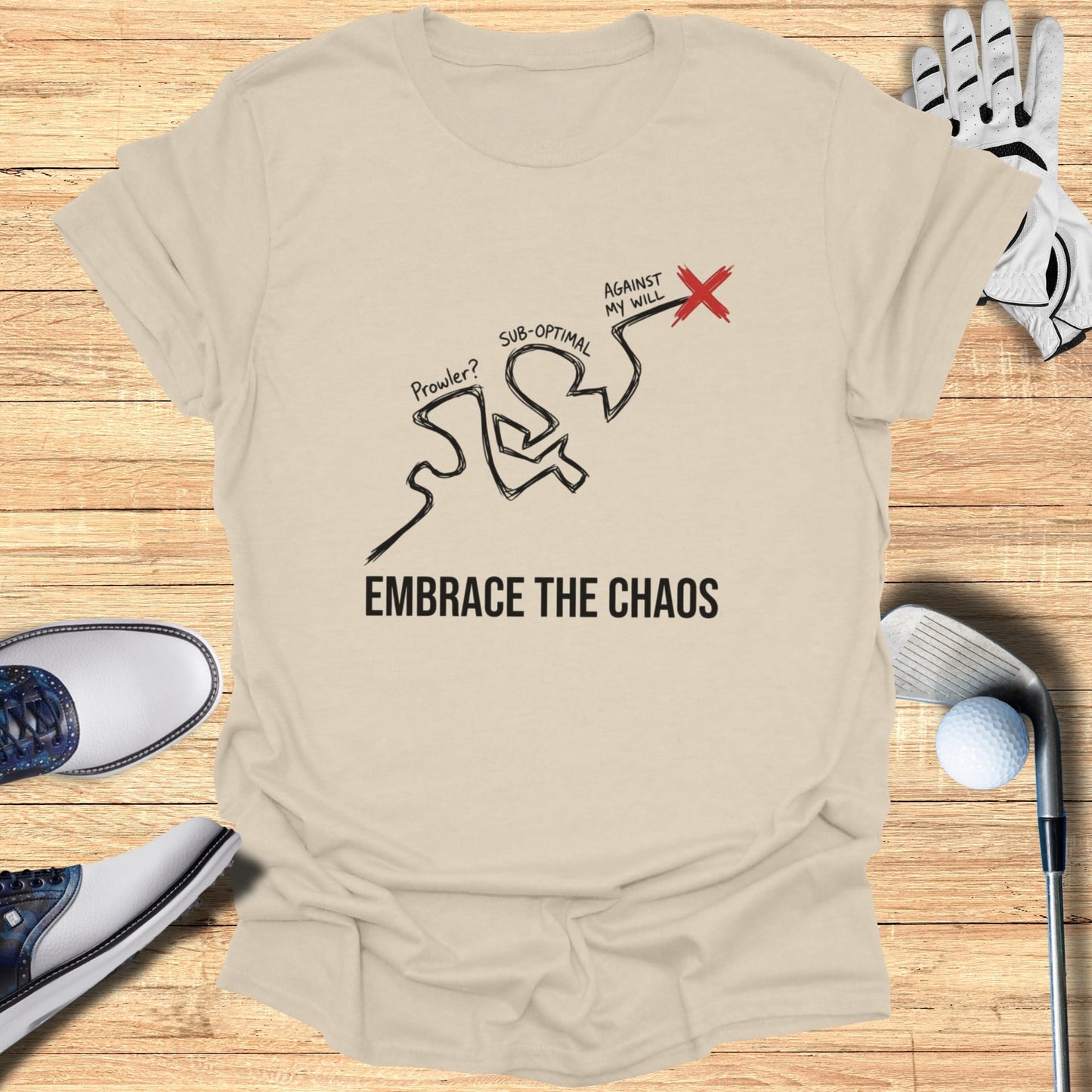 T-shirt with "Embrace the Chaos" and a chaotic line drawing, golf clubs and balls.