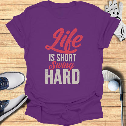 Purple t-shirt with "Life IS SHORT Swing HARD" text in red and grey.