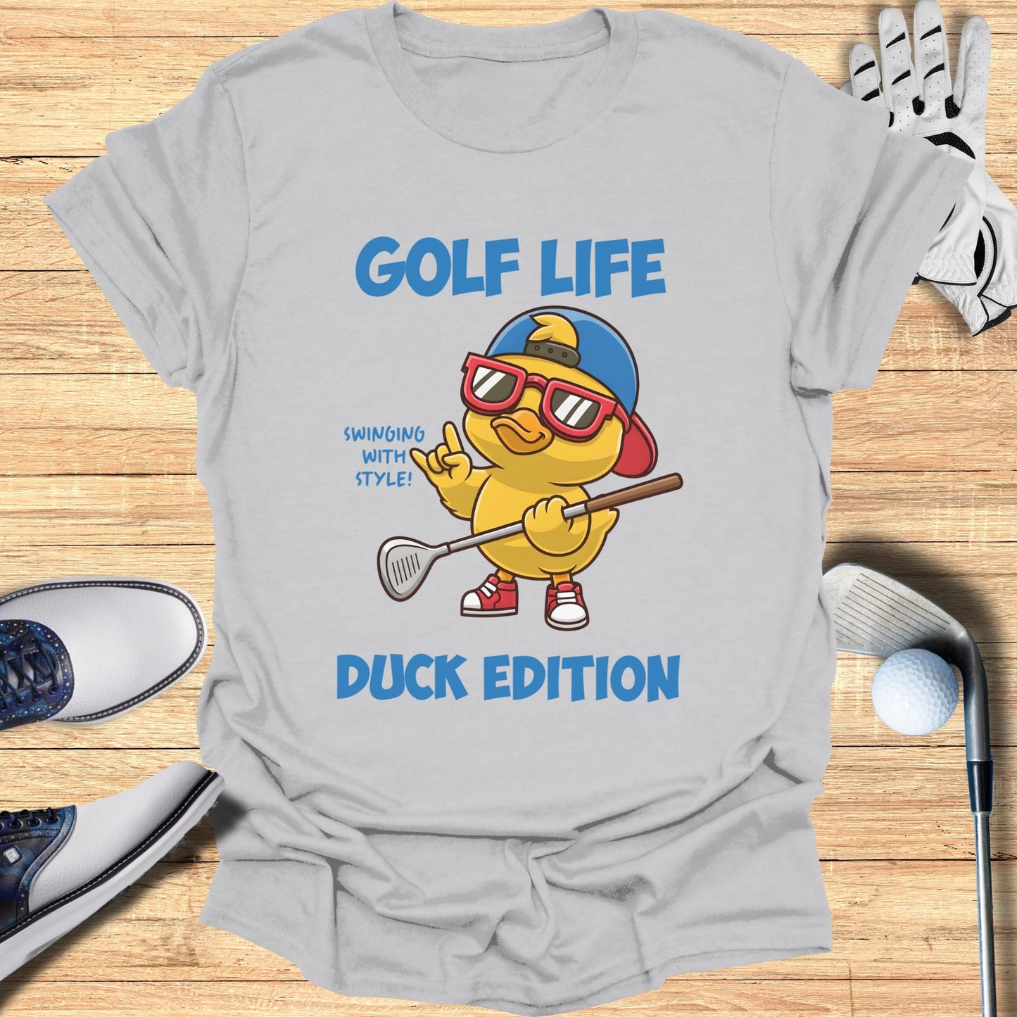 Cartoon duck golfer wearing sunglasses and a hat, holding a golf club.