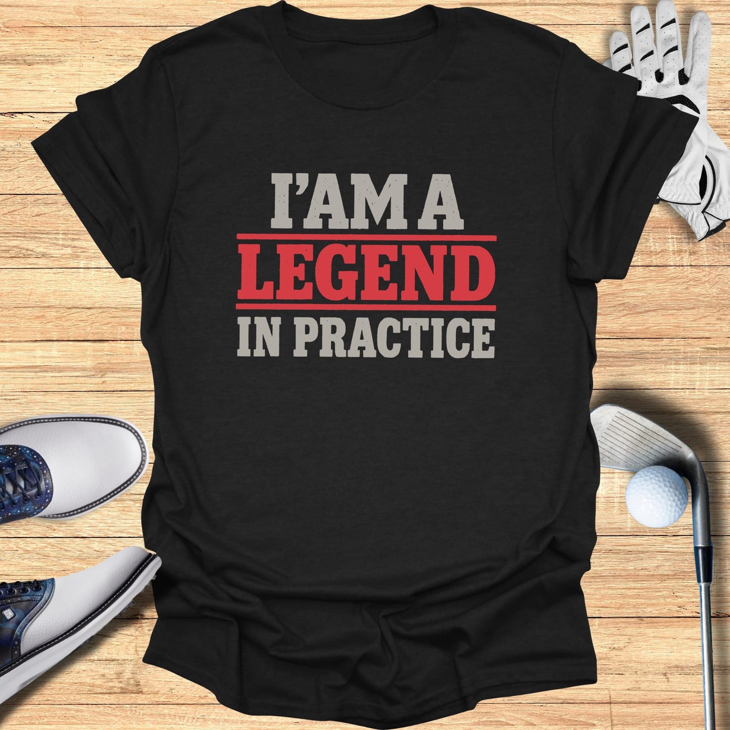 Black t-shirt with "I'M A LEGEND IN PRACTICE" text in red and white.