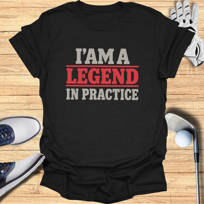 Black t-shirt with "I'M A LEGEND IN PRACTICE" text in red and white.