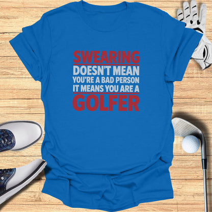 Blue t-shirt with red text: "SWEARING DOESN'T MEAN YOU'RE A BAD PERSON IT MEANS YOU ARE A GOLFER"