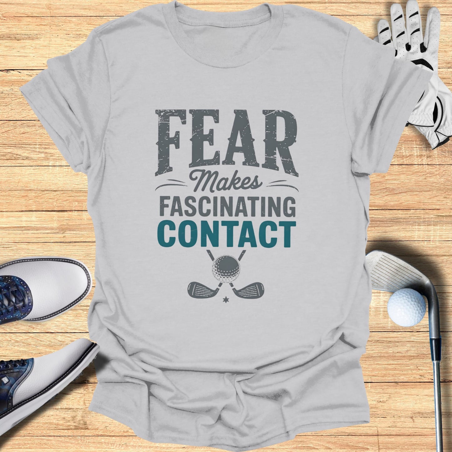 Gray t-shirt with "FEAR MAKES FASCINATING CONTACT" and golf club graphic.