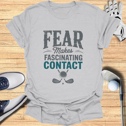 Gray t-shirt with "FEAR MAKES FASCINATING CONTACT" and golf club graphic.