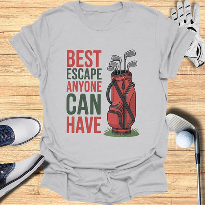 T-shirt with text "BEST ESCAPE ANYONE CAN HAVE" and golf bag graphic.