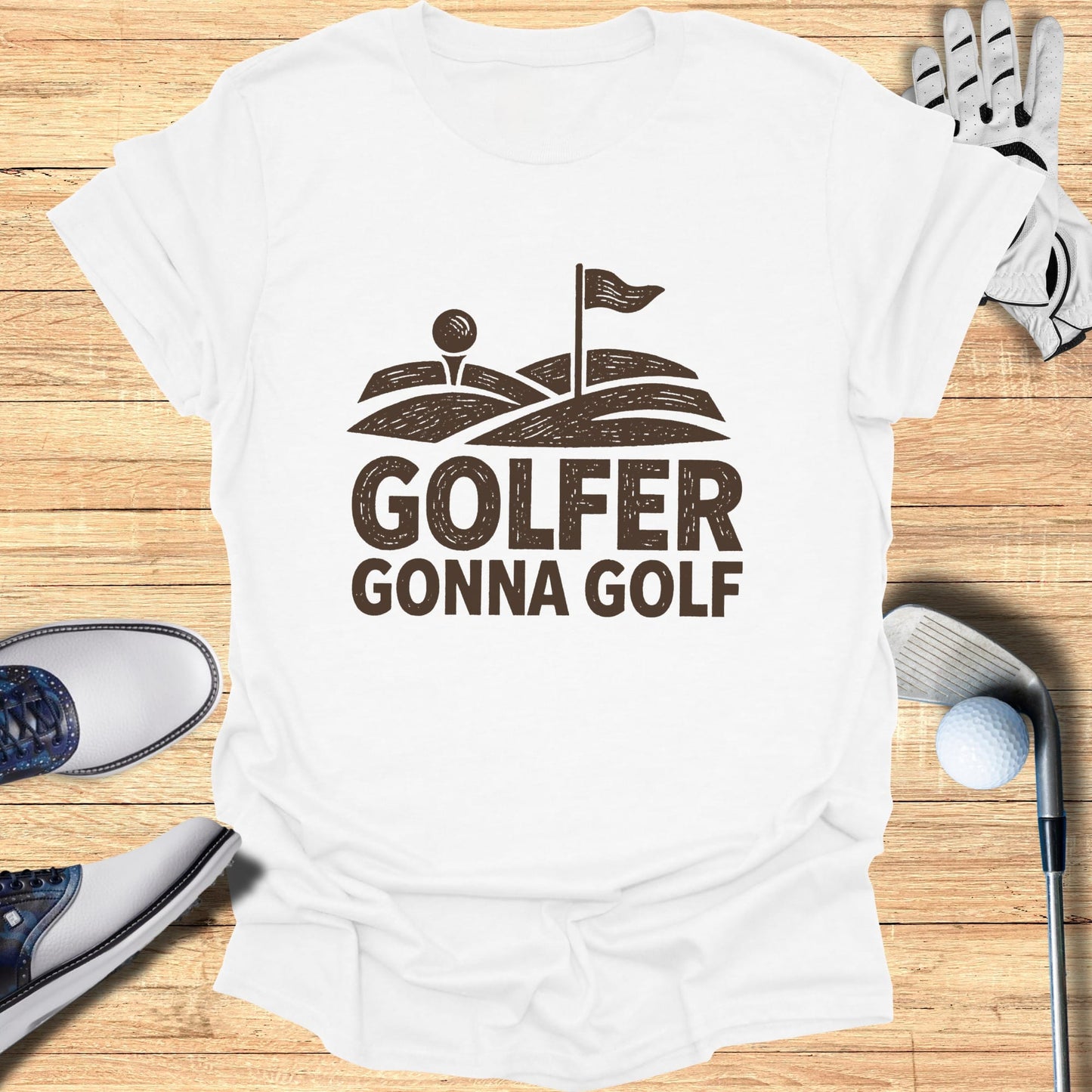 White t-shirt with "Golfer Gonna Golf" text and golf graphic.