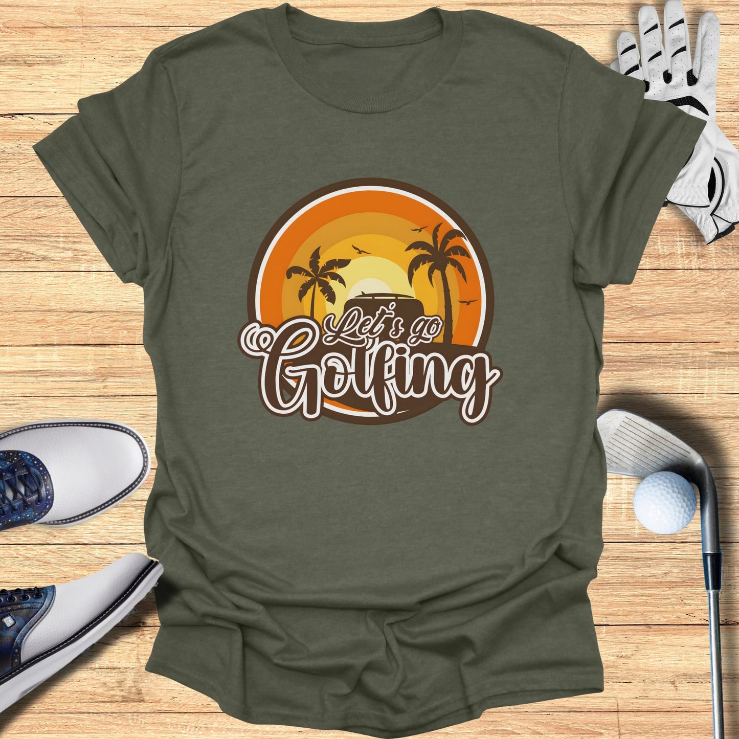 T-shirt with "Let's go Golfing" text and sunset scene.