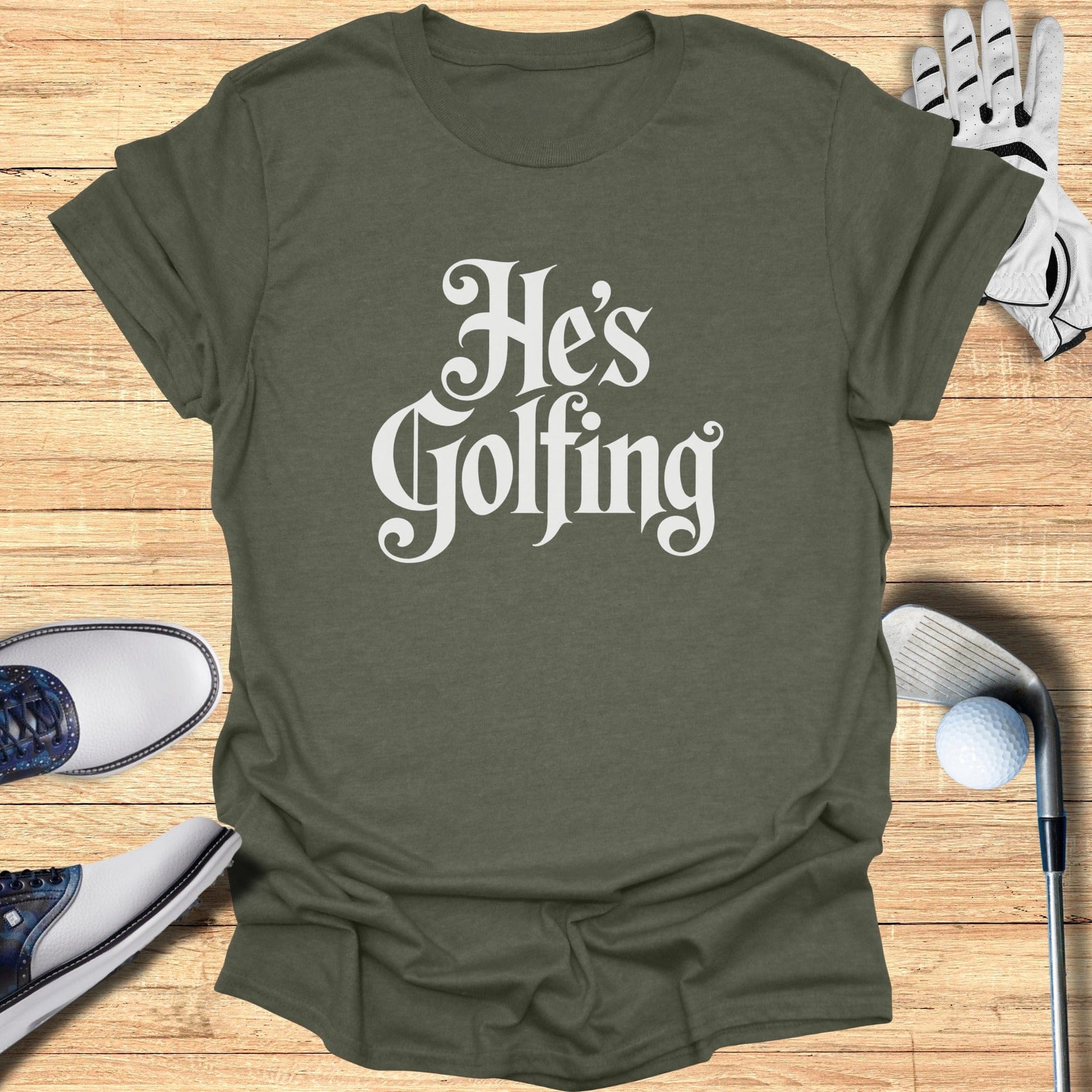 He's Golfing Graphic Teeshirt for Golf Enthusiasts