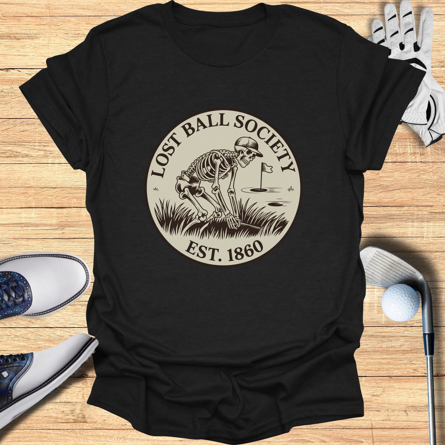 Black t-shirt with "Lost Ball Society Est. 1860" skeleton logo.