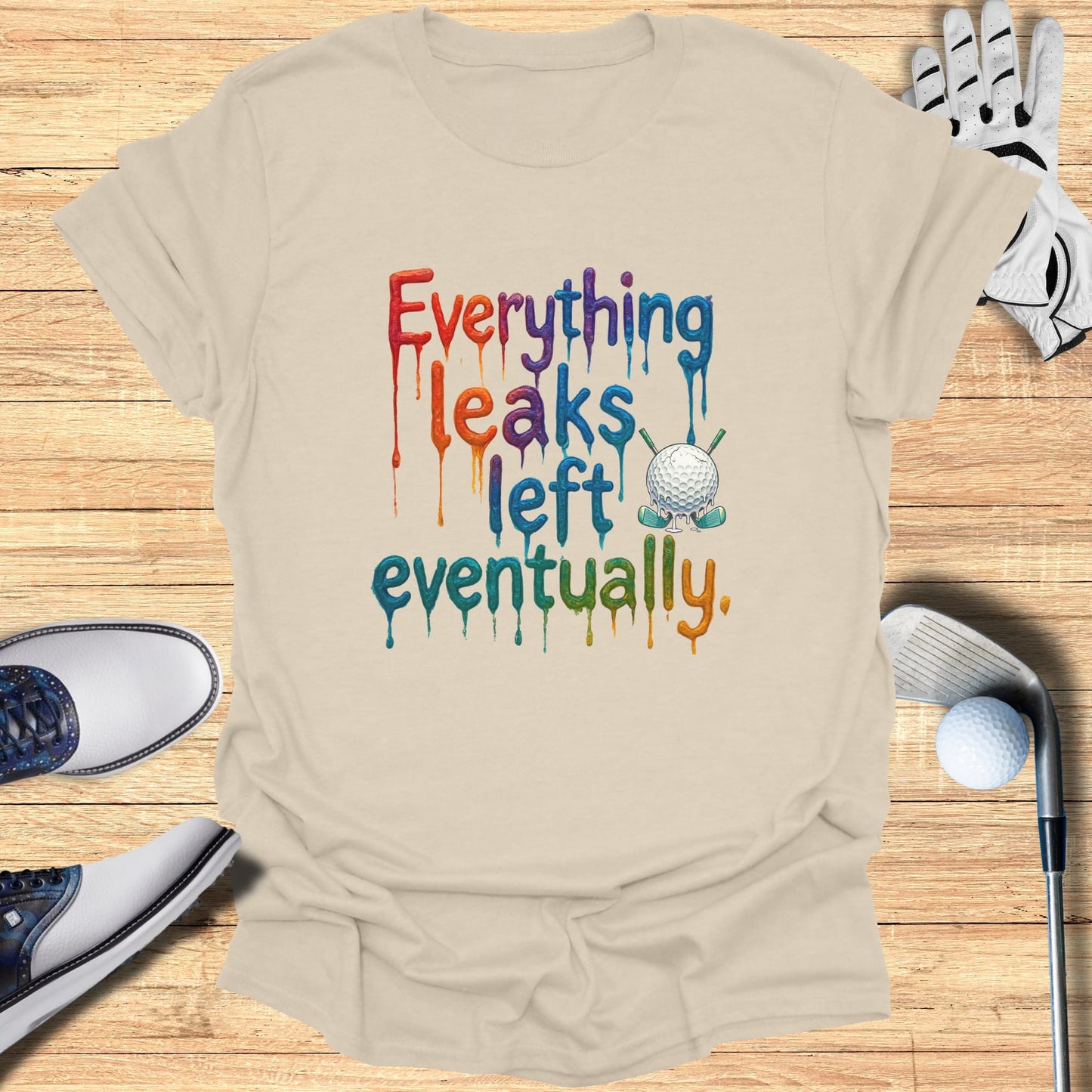 T-shirt with "Everything Leaks Eventually" and golf graphic.