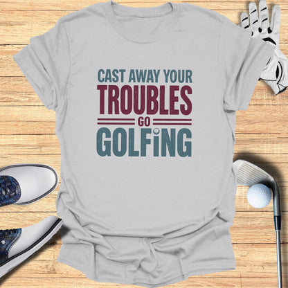 Gray t-shirt with "Cast Away Your Troubles Golfing" text design.